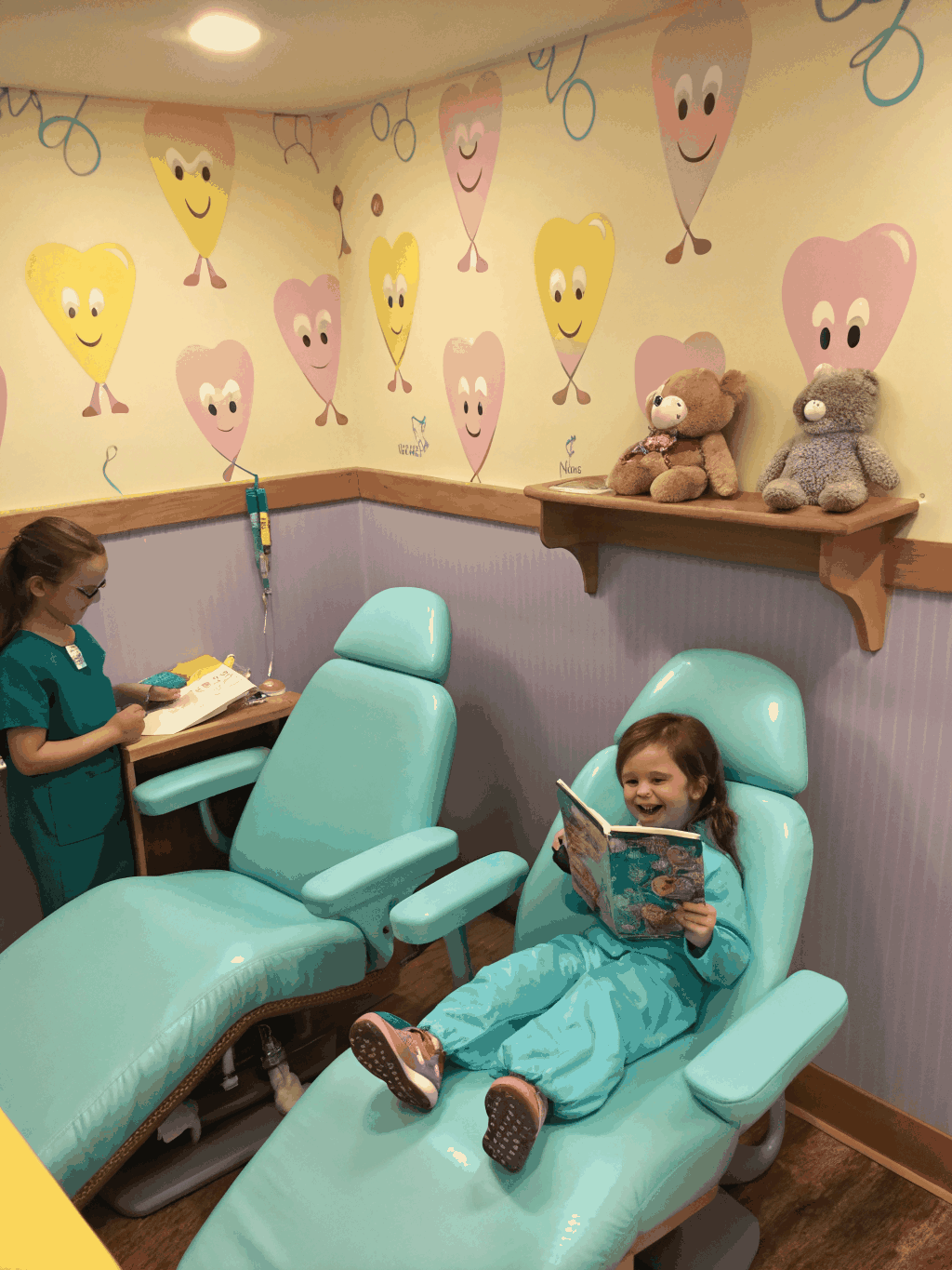 Dentist consulting with a patient in a warm clinic
